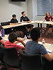 Youth Commission sitting around table